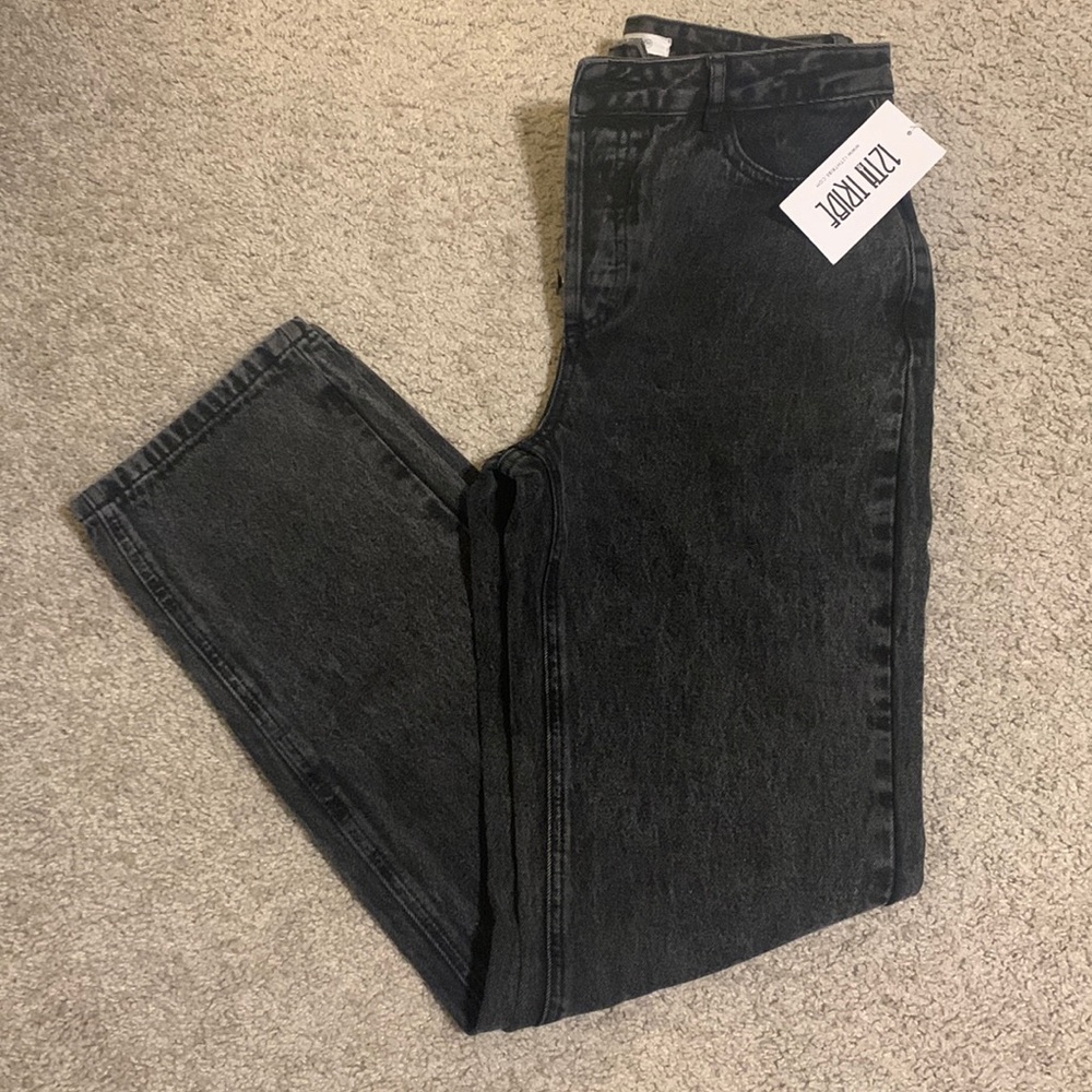 Black asymmetric waist straight leg jean